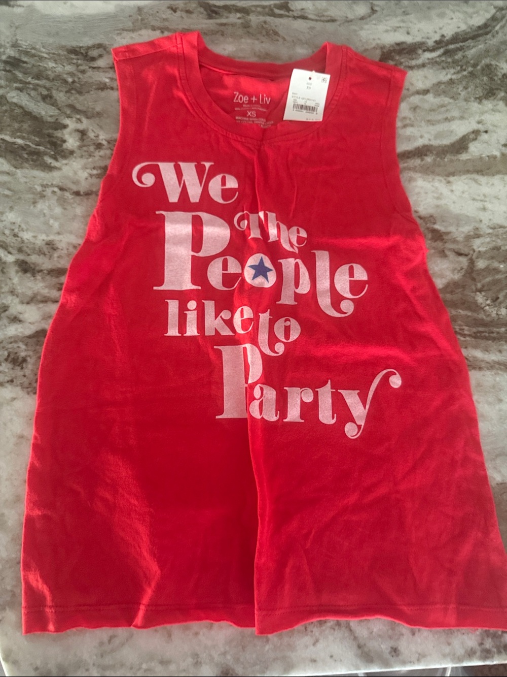 New with tags 
Zoe + Liv Red Graphic Muscle Tank with White Text 9842